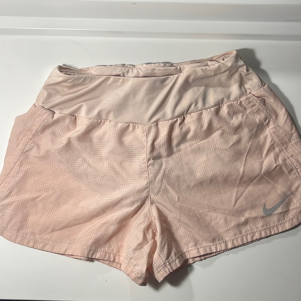 Coral Nike shorts